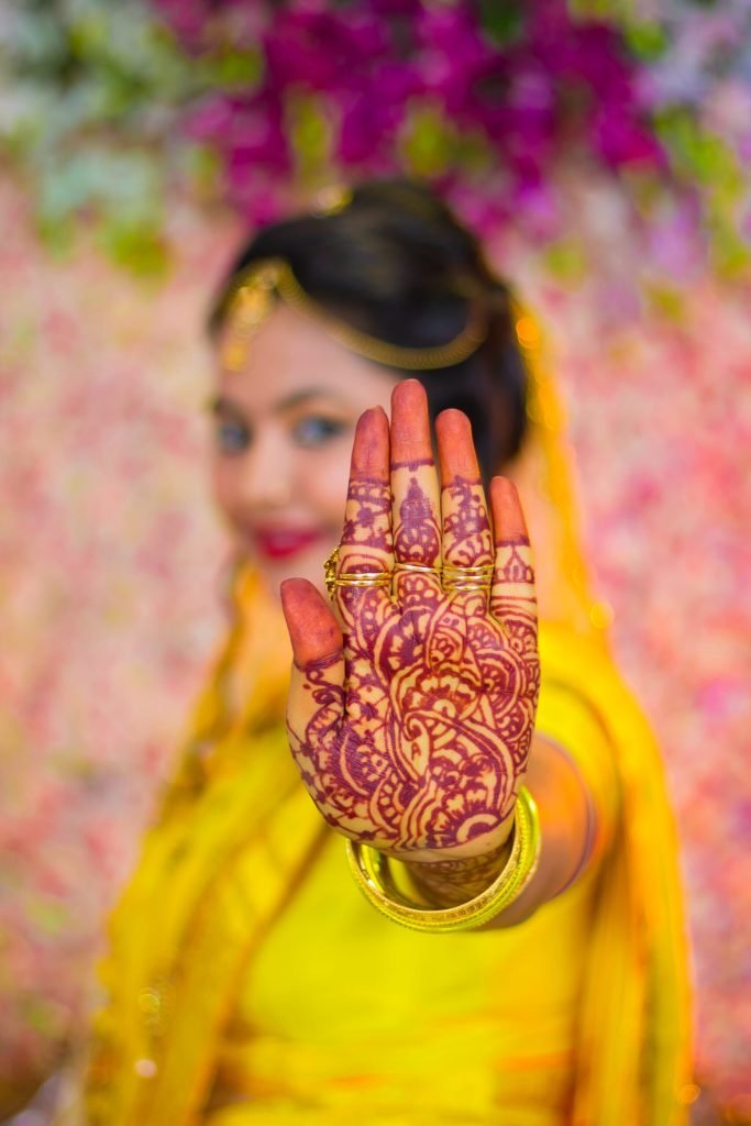 Woman Showing Mehndi Tattoo